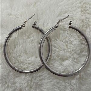 Silver Hoop Earrings 1.5 
Not too thick not too big hoops. 
Office to dinner.